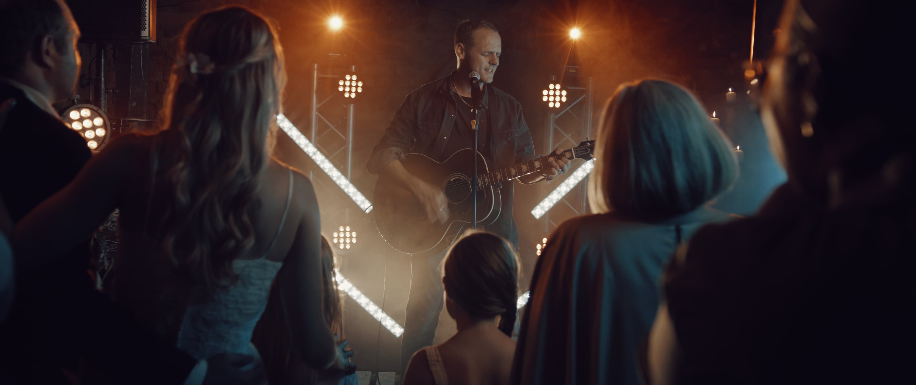 A live musician performing for guests at an event